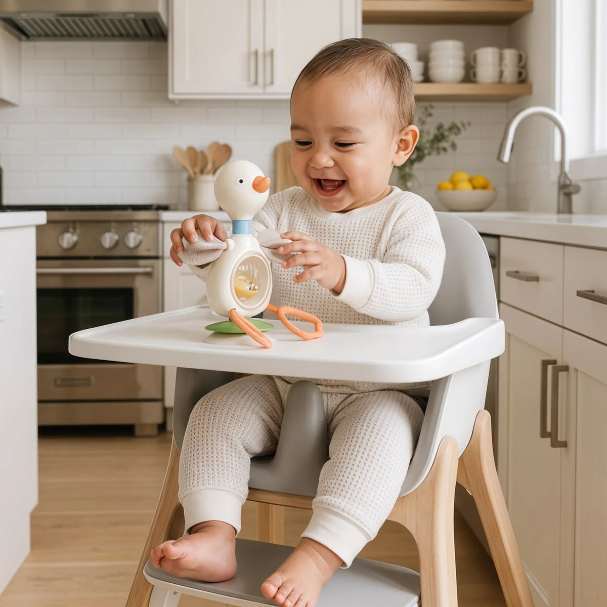 Itzy Twist & Bop™ - High Chair Sensory Toy Goose Itzy Ritzy Lil Tulips