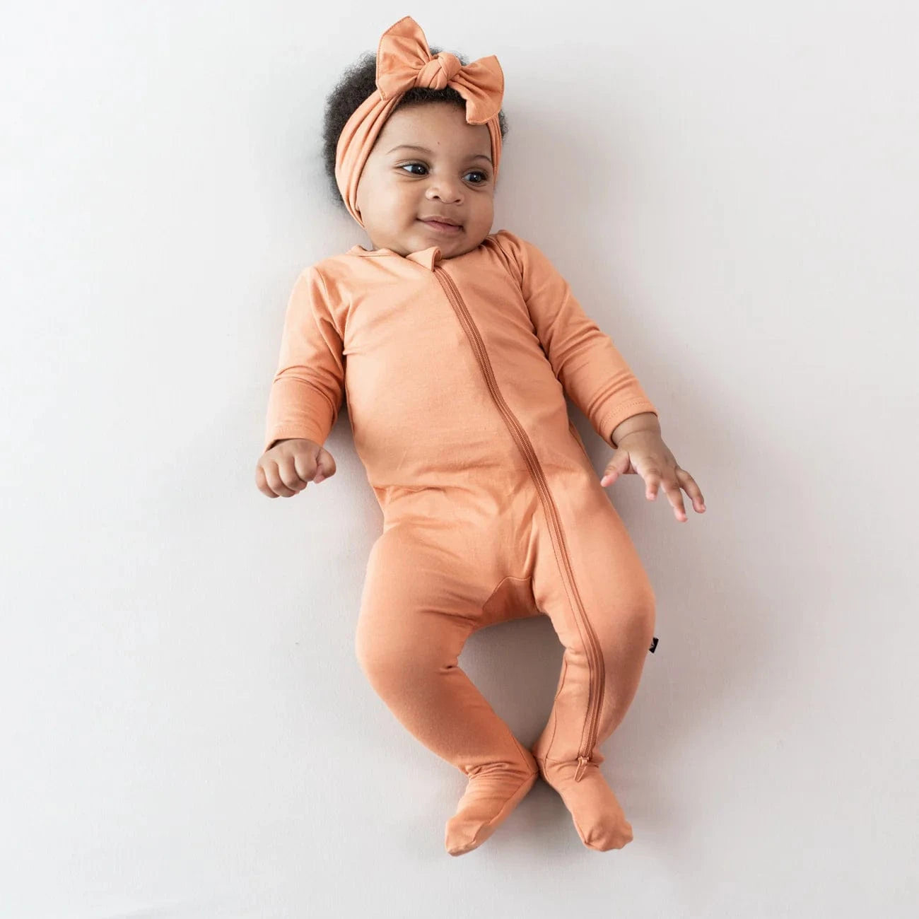 Zippered Footie in Apricot Kyte Baby Lil Tulips