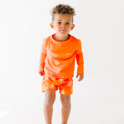 Neon Orange Palms Swim Trunks