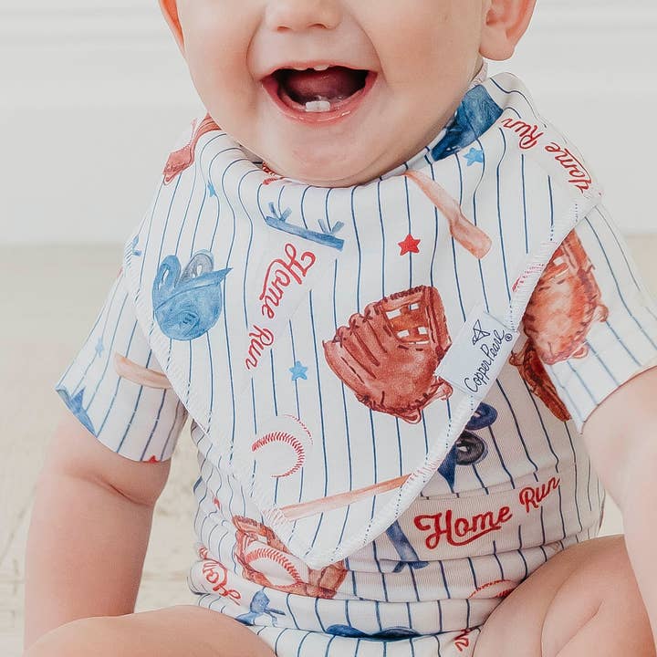 Baby wearing Copper Pearl All Star bandana bib