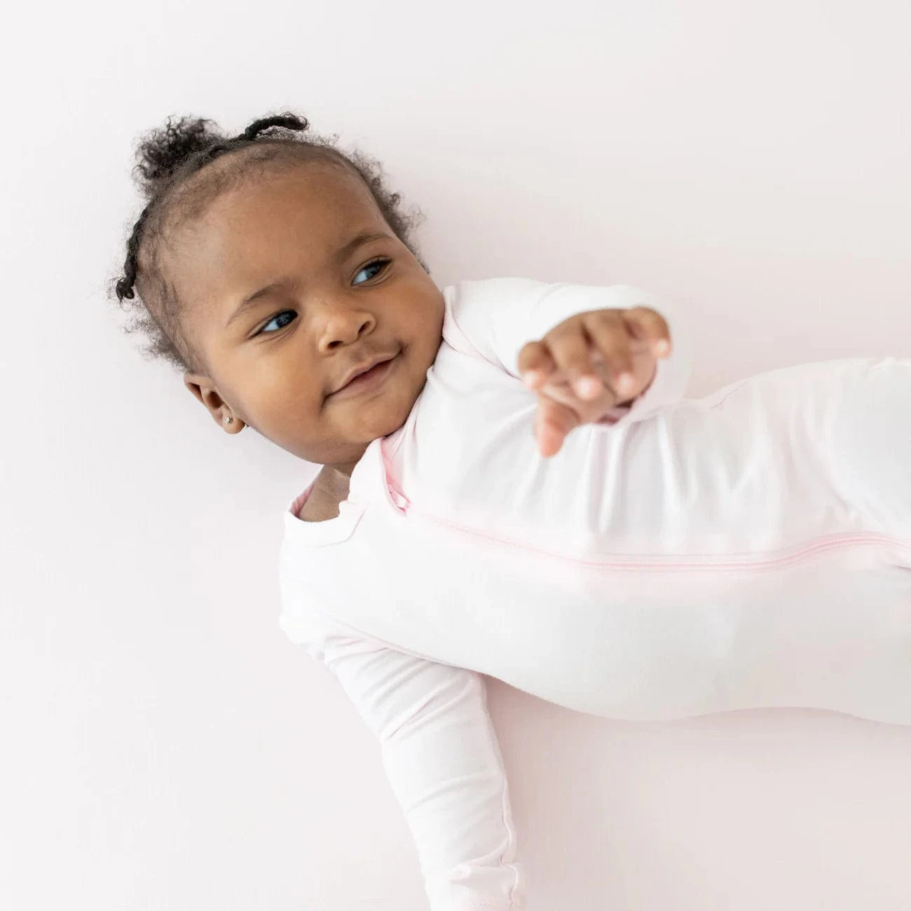 Zippered Footie in Sakura Kyte Baby Lil Tulips