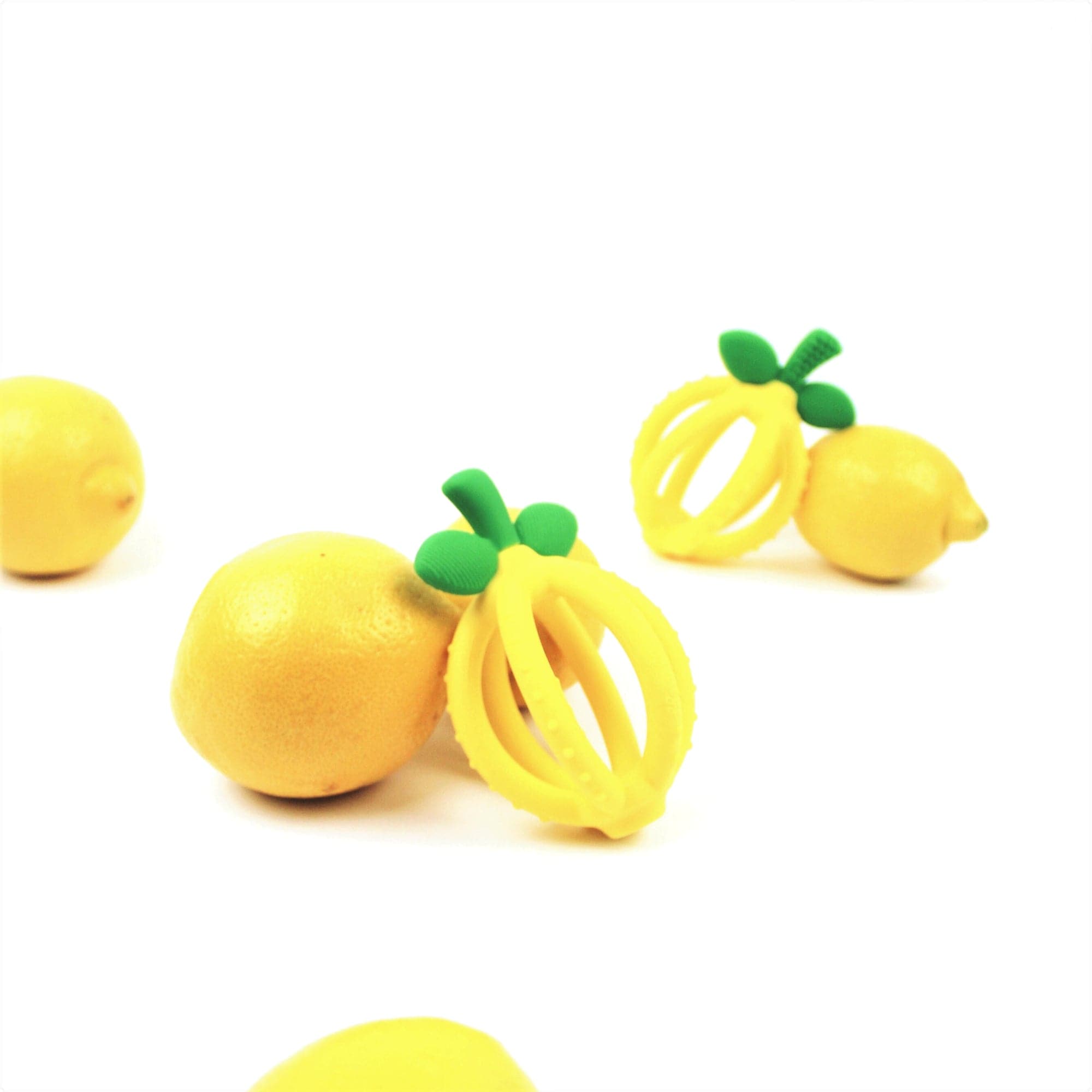 Lemon Bitzy Biter™ Teething Ball Baby Teether Itzy Ritzy Pacifiers & Teethers Lil Tulips